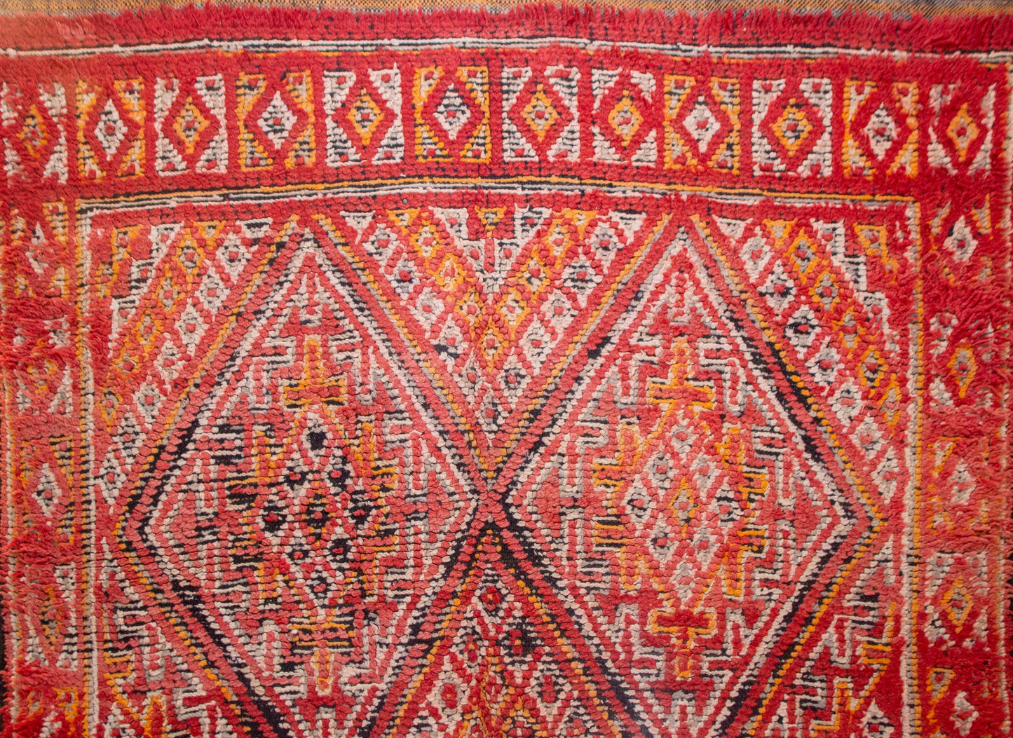 Aït Zayane Crimson Lattice — Nested Diamond Medallions with Guard Borders