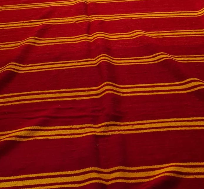 Amazigh Hanbel — Saffron Bands on Pomegranate