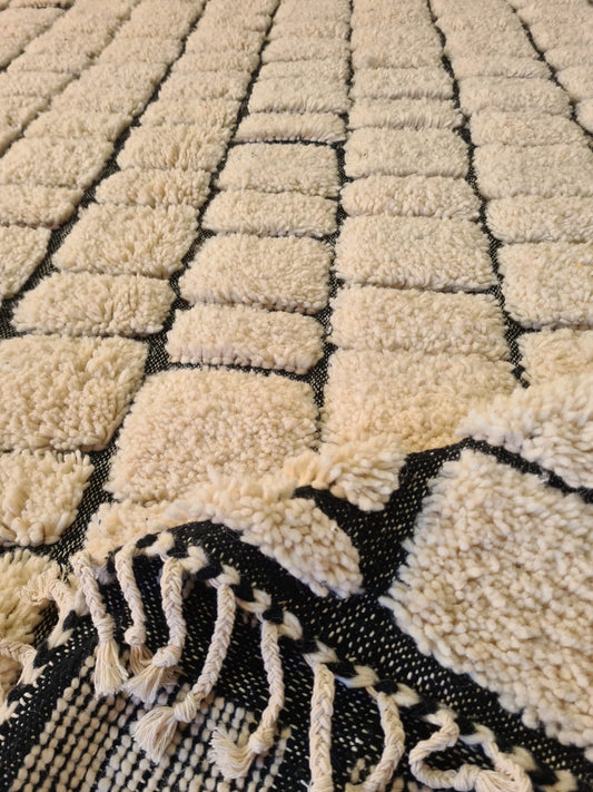 Paved Black Rivers Nomadic Grids – Sculpted Beni Ourain Rug in Raised Wool Relief