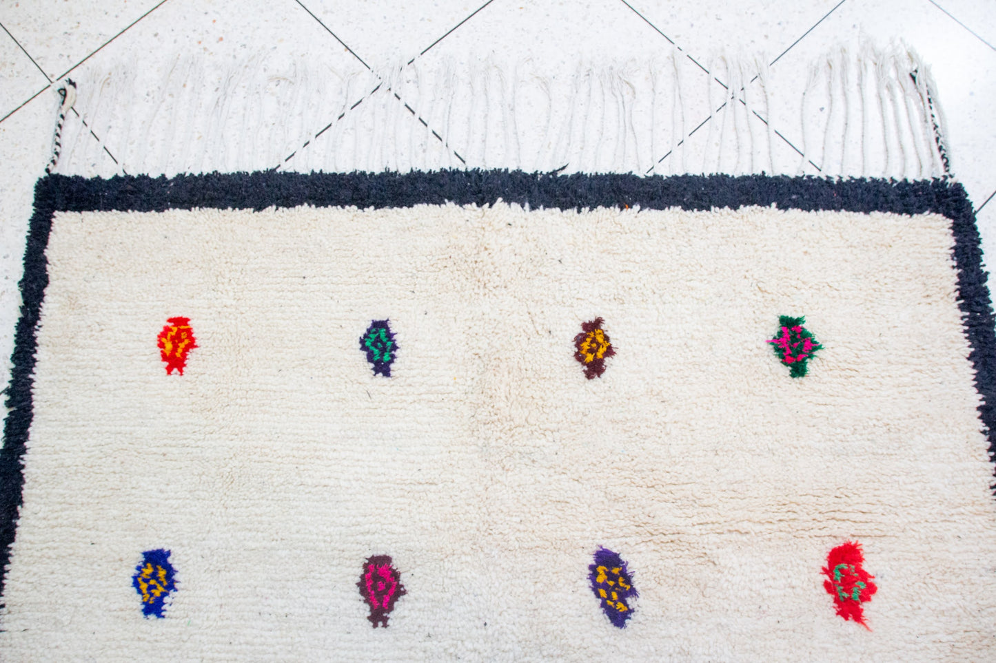 Azilal Ivory Field with Sprig Motifs — Charcoal Border