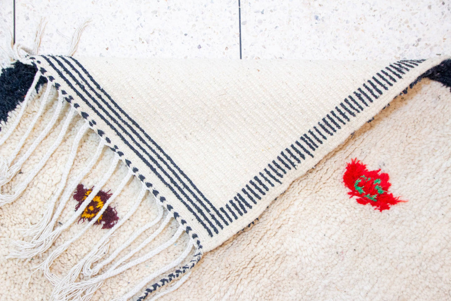 Azilal Ivory Field with Sprig Motifs — Charcoal Border