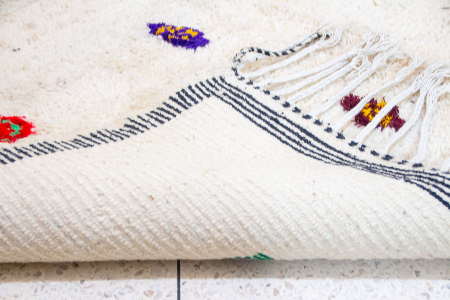 Azilal Ivory Field with Sprig Motifs — Charcoal Border
