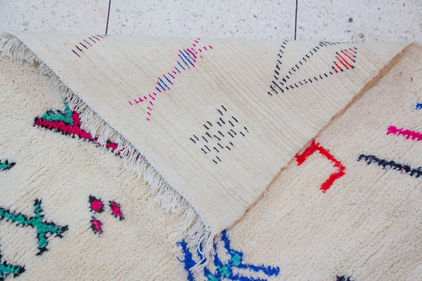 Azilal Glyph Scatter — Ivory Field with Multicolor Signs