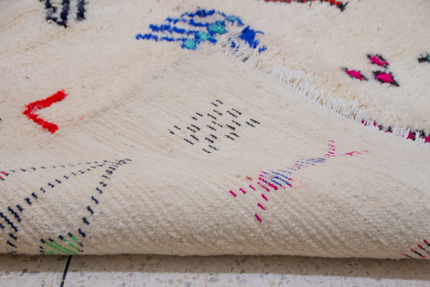 Azilal Glyph Scatter — Ivory Field with Multicolor Signs