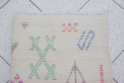 Azilal Glyph Scatter — Ivory Field with Multicolor Signs
