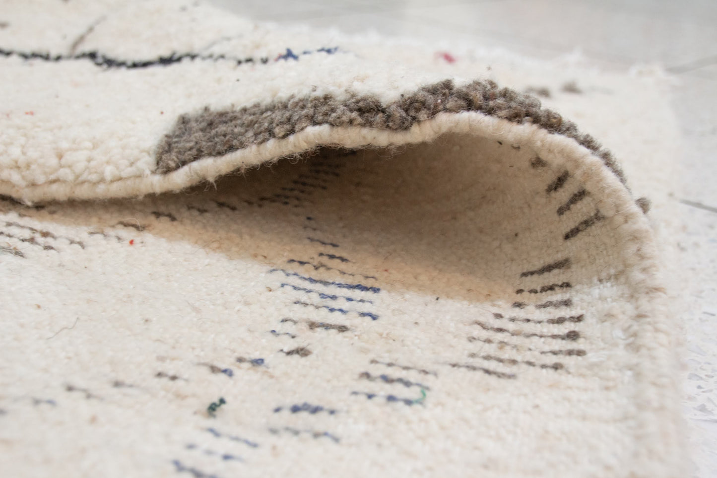 Azilal Pile Rug — Ivory Field with Calligraphic Linework & Atlas Motifs
