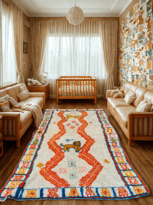 Nursery room with a decorative rug featuring animal illustrations, beige sofas, and wooden crib.