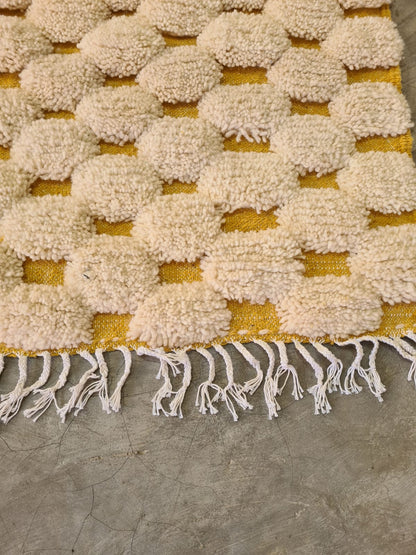 Golden Tesserae – Beni Mrirt PomPom Grid in Handspun Wool