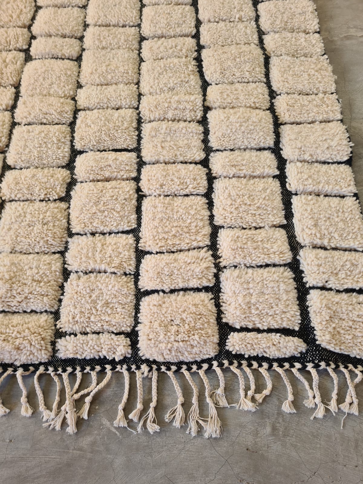 Paved Black RiversNomadic Grids – Sculpted Beni Ourain Rug in Raised Wool Relief