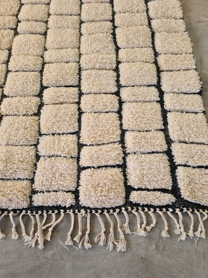 Paved Black RiversNomadic Grids – Sculpted Beni Ourain Rug in Raised Wool Relief