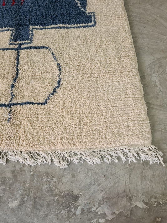 Guardians of the Loom – Blue Fibule Rug from Beni Mrirt