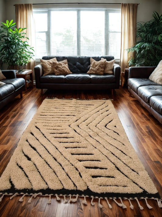 Beige rug with zigzag pattern on a wooden floor in a living room setting.