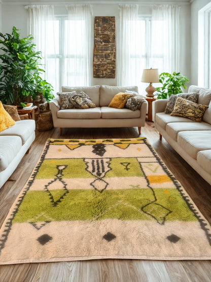 Living room with a patterned rug, beige sofa, and decorative pillows.